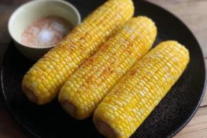 Delicious Air Fryer Corn on the Cob served with butter and seasoning