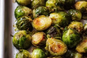 Delicious roasted Brussels sprouts garnished with herbs and spices