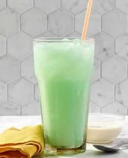 Taco Bell Dirty Mountain Dew Baja Blast Dream Soda served in a glass