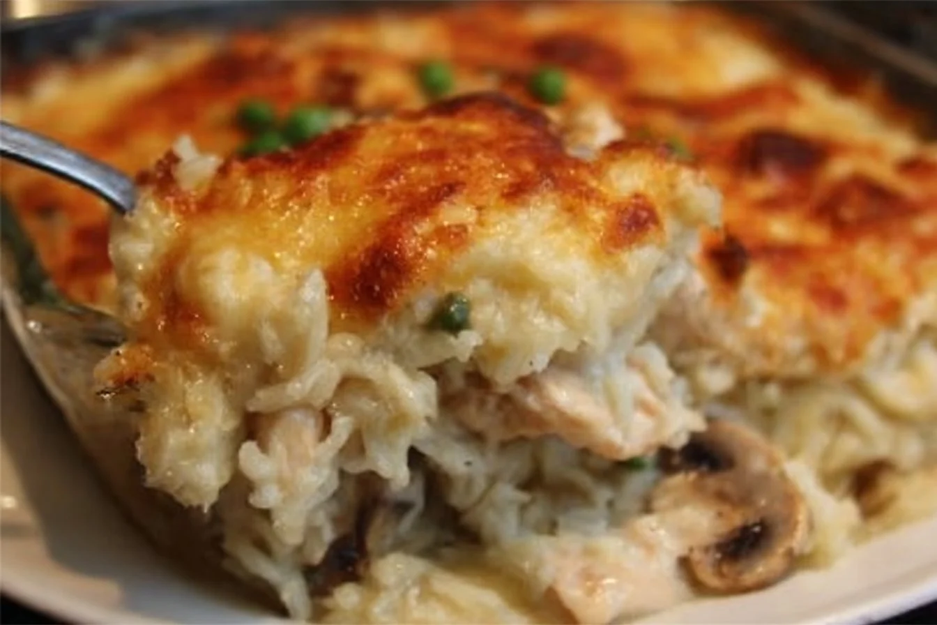 Creamy Cheesy Chicken Rice Casserole in a baking dish